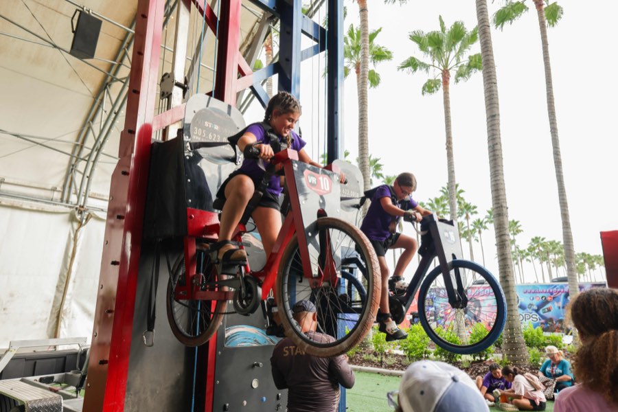 Children playing at the video game trailer